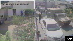 FILE —This screen grab taken from a security camera footage and released by the Israeli army on November 19, 2023, shows what the army reports as an Israeli army military vehicle parked at Al-Shifa hospital on November 7.