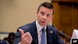 FILE - Acting Secretary of Homeland Security Kevin McAleenan speaks at a House Committee on Oversight and Reform hearing on Capitol Hill, July 18, 2019. 