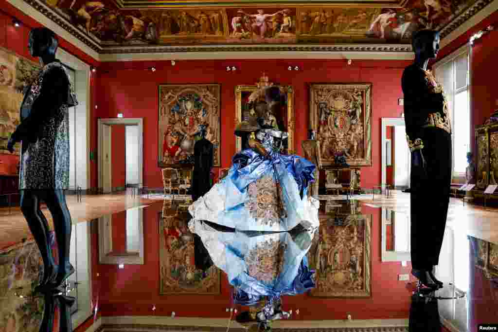 A dress designed by John Galliano for fashion house Christian Dior from the Haute Couture F/W 2006-2007 collection is displayed at the exhibition &quot;Louvre Couture. Art and fashion: statement pieces&quot; at the Louvre Museum in Paris, France. 