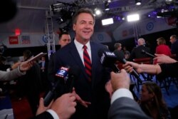 Democratic 2020 U.S. presidential candidate Montana Governor Steve Bullock talks to the media after the first night of the second 2020 Democratic U.S. presidential debate in Detroit, Michigan, July 30, 2019.