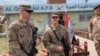Arhiva - Američki vojnici tokom ceremonije predaje dužnosti na Kajara aerodromu iračkim snagama bezbednosti, južno od Mosula, Irak, 27. marta 2020.