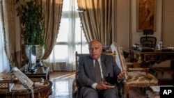 Egyptian Foreign Minister Sameh Shukry speaks during an interview with The Associated Press at his office, Cairo, Egypt, June 21, 2020. 