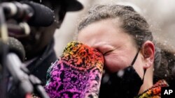 Katie Wright, mother of Daunte Wright, cries as she speaks during a news conference in snowfall, April 13, 2021, in Minneapolis. Daunte Wright, 20, was shot and killed by police Sunday after a traffic stop in Brooklyn Center.