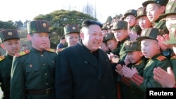 North Korean leader Kim Jong Un visited Mangyongdae Revolutionary School and planted trees with its students on Thursday, the Tree-planting Day, in this undated photo released by North Korea's Korean Central News Agency (KCNA) in Pyongyang March 3, 2017.