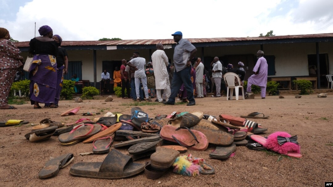 FILE - The belongings of students of Bethel Baptist High School are scattered on school premises as parents of abducted students hope for their return, in the Chikun Local Government Area of Kaduna state, northwest Nigeria, July 14, 2021. 