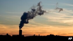 FILE - The Marshall Steam Station coal power plant operates March 3, 2024, near Mooresville, N.C. A rule issued April 24, 2024, by the Environmental Protection Agency would force power plants fueled by coal or gas to capture smokestack emissions or shut down.
