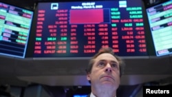 A trader works on the floor of the New York Stock Exchange (NYSE) in New York, March 9, 2020.