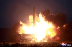FILE - A missile is launched during testing at an unidentified location in North Korea, in this undated image provided by KCNA, Aug. 7, 2019.