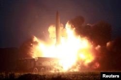 FILE - A missile is launched during testing at an unidentified location in North Korea, in this undated image provided by KCNA, Aug. 7, 2019.