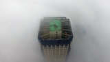 A building appears through a thick layer of fog in Yangzhou, in China&#39;s eastern Jiangsu province.