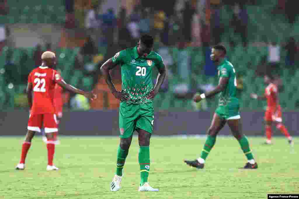 Guinea-Bissau&#39;s defender Sori Mane (C) reacts after a draw in the match against Sudan.