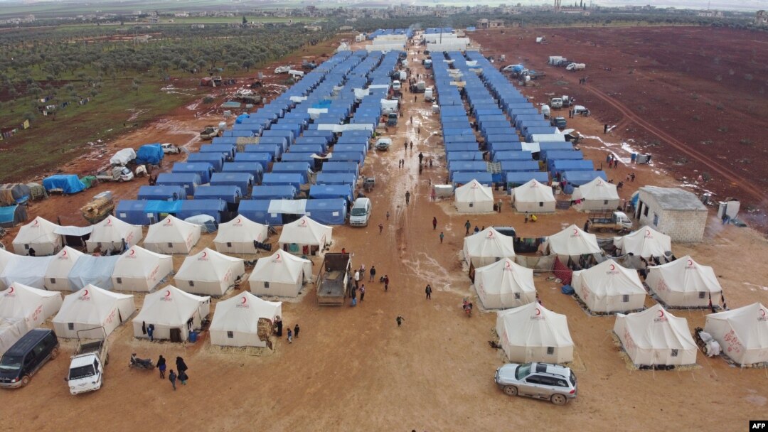 A new camp for internally displaced people is shown near Maarrat Misrin, in Syria's Idlib province. An estimated 170,000 of the 900,000 civilians forced from their homes in northwestern Syria are living out in the open, the U.N. says.