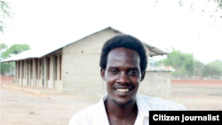 Rudwan Dawod, in front of the Manute Bol Primary School in Turalei (Nancy Dawod).