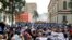 Police block rotesters during the demolition of the national theater building in Tirana, Albania, May 17, 2020.