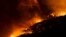 A bushfire burns at Wye River near Lorne, south of Melbourne, Dec. 25, 2015.