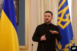 Ukrainian President Volodymyr Zelenskyy speaks to journalists during press conference in Kyiv, Feb. 26, 2025.