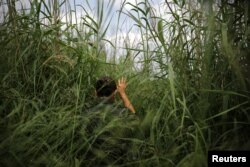 A U.S. border patrol agent patrols a trail along the Rio Grande river at the border between United States and Mexico, in Roma, Texas, May 11, 2017.