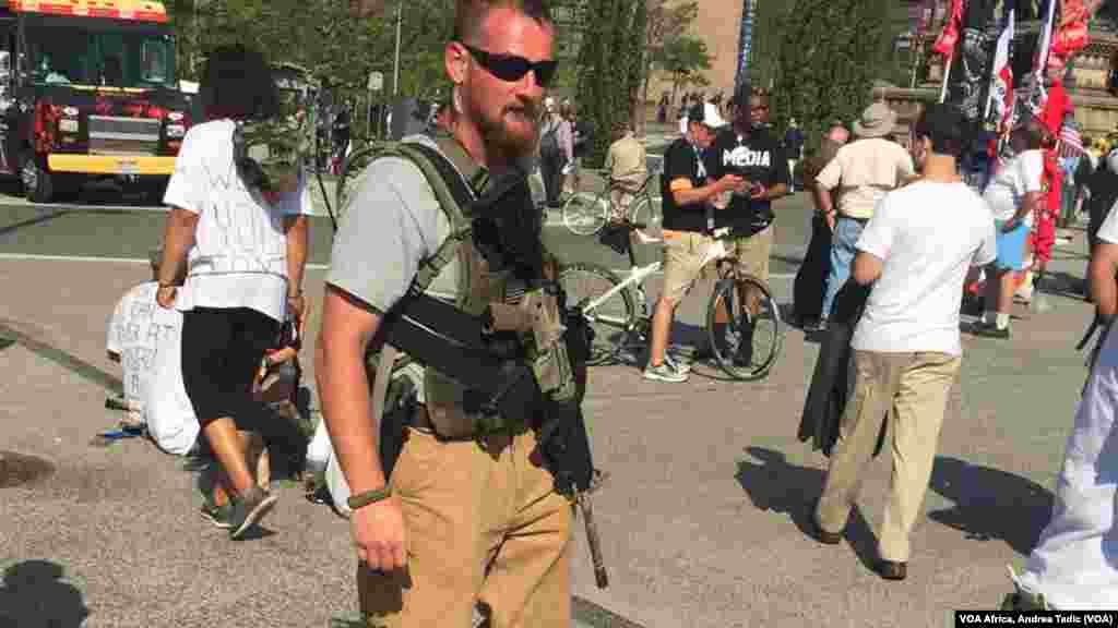 Civilian armed with assault rifle under Ohio's open carry gun laws.