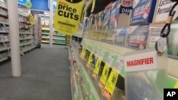 CVS stores offer magnifiers for customers who might have trouble reading the small print on labels.