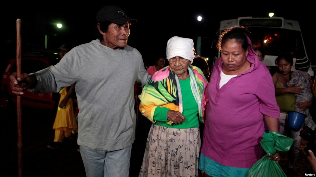 People who were evacuated from their home arrive at the Bluefields Port before the arrival of Hurricane Otto in Bluefields, Nicaragua, Nov. 23, 2016.