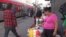 Guadalupe Santiago sells hot dogs from a small cart in Los Angeles, California. Once the city sets regulations for vending permits, she plans to upgrade equipment or meet any other requirements. (A. Martinez/VOA)