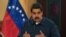 FILE - Venezuela's President Nicolas Maduro speaks during a meeting with ministers at the Miraflores Palace in Caracas, Venezuela, Aug. 13, 2018.
