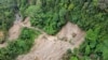 An aerial view shows a road cut off by a landslide that killed at least seven people in Sibolangit, North Sumatra, Indonesia, on Nov. 28, 2024.