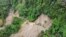 An aerial view shows a road cut off by a landslide that killed at least seven people in Sibolangit, North Sumatra, Indonesia, on Nov. 28, 2024.