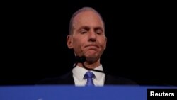 FILE - Boeing Co Chief Executive Dennis Muilenburg speaking during a news conference at the annual shareholder meeting in Chicago, Illinois, April 29, 2019.