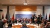 Les membres du comité international prennent place pour une réunion de suivi sur la Libye, organisée par le ministre allemand des Affaires étrangères Heiko Maas, à Munich, Allemagne, dimanche, février. 16, 2020. (Michael Dalder / Photo de la piscine via AP)