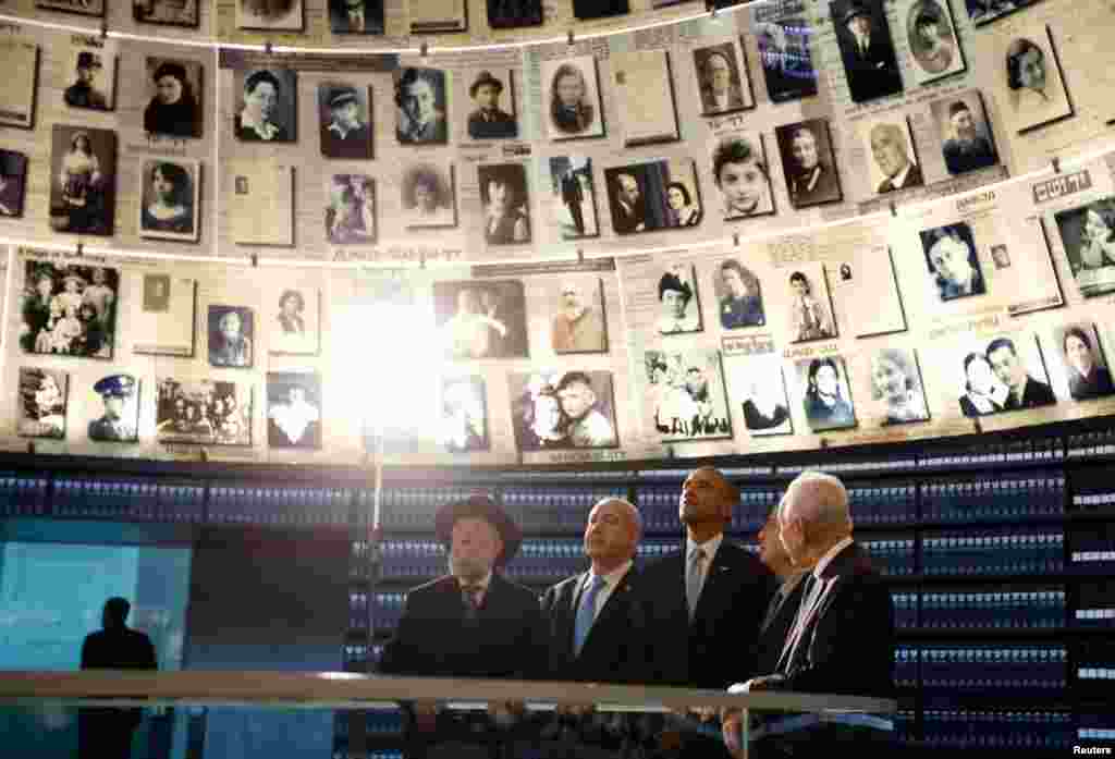 Obama tours the Hall of Names during his visit to the Yad Vashem Holocaust Memorial in Jerusalem, March 22, 2013. With him are Rabbi Israel Meir Lau, Israeli Prime Minister Benjamin Netanyahu, Chairman of the Yad Vashem Directorate Avner Shalev and Israeli President Shimon Peres.