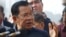 Tư liệu: Thủ tướng Campuchia Hun Sen phát biểu với hành khách của du thuyền Westerdam, ở cảng Sihanoukville, Campuchia ngày 14/2/2020. (AP Photo/Heng Sinith) 