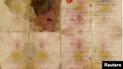 A letter written on April 13, 1912, and recovered from the body of Alexander Oskar Holverson, a Titanic victim, is seen in this photograph received via Henry Aldridge & Son, in London, Britain, Oct. 20, 2017.