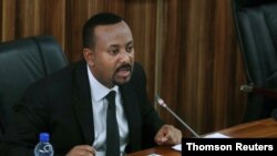 Ethiopia's Prime Minister Abiy Ahmed addresses the legislators on the current situation of the country inside the Parliament buildings in Addis Ababa, Ethiopia, July 1, 2019.