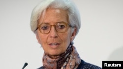 Managing Director of the International Monetary Fund Christine Lagarde speaks at a press conference at the Treasury in London, Dec. 11, 2015. A French court has ordered Lagarde to face trial over her role in a pay-out of some 400 million euros ($434 million) to businessman Bernard Tapie, her lawyer said on Dec. 17, 2015.