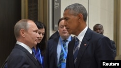 Shugaban Rasha Vladimir Putin (Hagu) da takwaran aikinsa na Amurka Barack Obama (Dama) a lokacin wani taro a China a watan Satumba