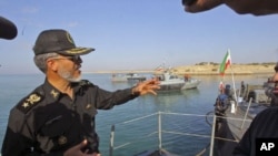 Iran's top naval officer, Admiral Habibollah Sayyari gestures as he speaks during the Velayat-90 war game on the Sea of Oman near the Strait of Hormuz, in southern Iran, December 28, 2011.