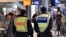 Police patrol in the main train station in Cologne, Germany, Jan. 18, 2016. Authorities have arrested a 26-year-old Algerian man on suspicion of committing a sexual assault in Cologne during New Year's celebrations.