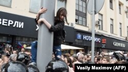 Participants of an unauthorized opposition rally gather in Tverskaya street in central Moscow on June 12, 2017