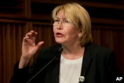 FILE - In this April 25, 2017, photo, Venezuela's Chief Prosecutor Luisa Ortega speaks during a news conference at her office in Caracas, Venezuela. Ortega has ordered some detained protesters to be freed after determining there was not enough evidence to