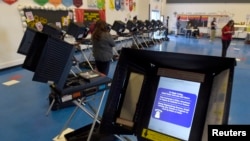 FILE - Voting machines are set up for people to cast their ballots during voting in the 2016 presidential election at Manuel J. Cortez Elementary School in Las Vegas, Nevada, Nov. 8, 2016