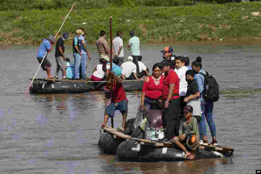 People ride rafts across the Suchiate River, back and forth between Ciudad Hidalgo, Mexico, top, and Tecun Uman, Guatemala.