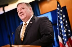 FILE - U.S. Secretary of State Mike Pompeo gives a news conference about dealings with China and Iran, and on the fight against the coronavirus disease (COVID-19) pandemic, in Washington, June 24, 2020.