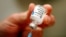 A nurse prepares an injection of the influenza vaccine at Massachusetts General Hospital in Boston, Massachusetts, Jan. 10, 2013.