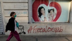 Graffiti asks for the freedom of Colombian businessman and Venezuelan special envoy Alex Saab, in Caracas, Venezuela, Saturday, Oct. 16, 2021. Saab will face money laundering charges in the U.S., a senior U.S. official said Saturday.