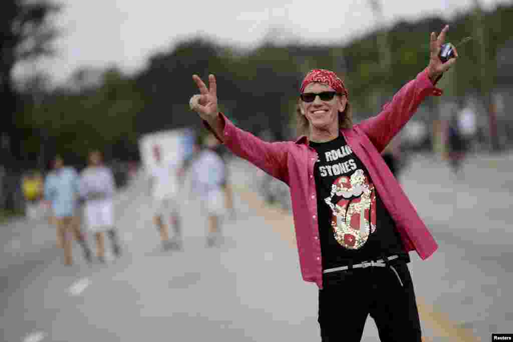 A fan reacts to the camera outside Ciudad Deportiva de la Habana sports complex where the Rolling Stones&#39; free outdoor concert is scheduled to take place in Havana, Cuba.