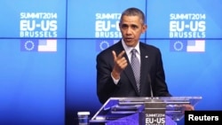 U.S. President Barack Obama speaks at a news conference during a EU-U.S. summit at the European Council in Brussels March 26, 2014.