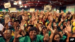 Delegates wait for the delayed start of the ruling African National Congress (ANC) elective conference in Johannesburg, Dec. 16 2017.