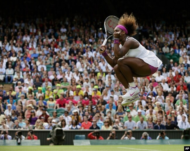 FILE - Serena Williams of the United States reacts after winning against Zheng Jie of China during a third round women's singles match at the All England Lawn Tennis Championships at Wimbledon, England, Saturday, June 30, 2012. (AP Photo/Anja Niedringhaus, File)