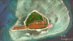 China's Spratly Island Building Said to Light Up the Night 'Like A City'